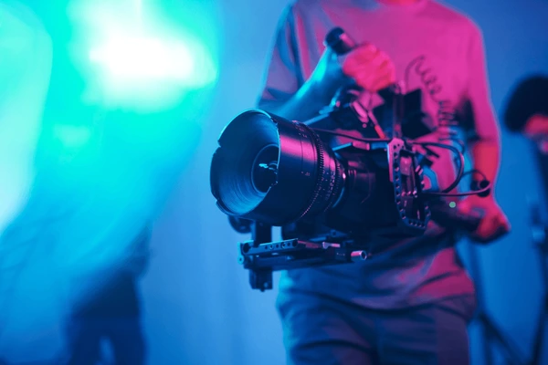 closeup-young-cameraman-shooting-professional-600nw-2284241605